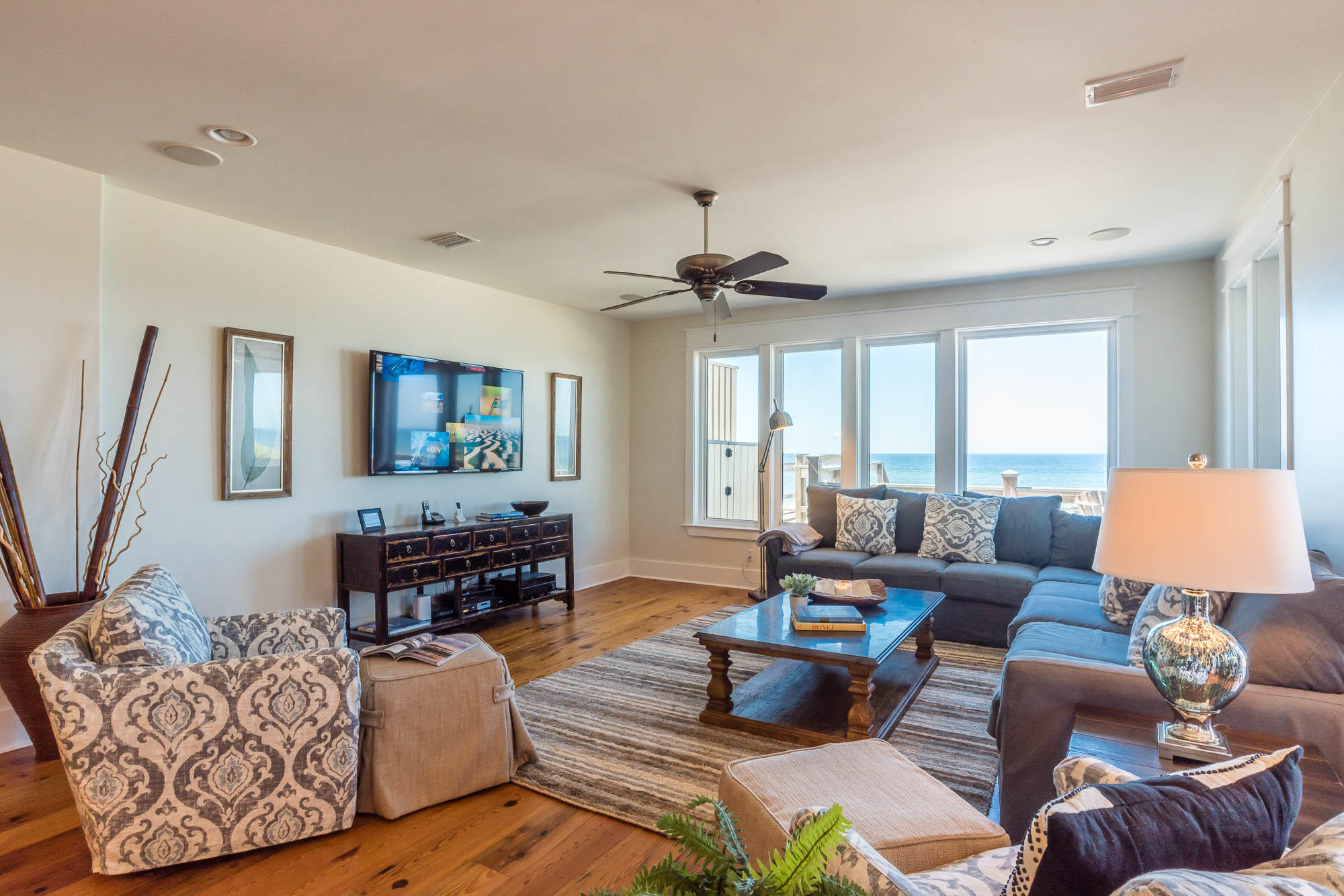 179 Pelican Circle Seacrest, FL 32461 - Photo 30 of 87 a living room with furniture or couch and a wooden floor