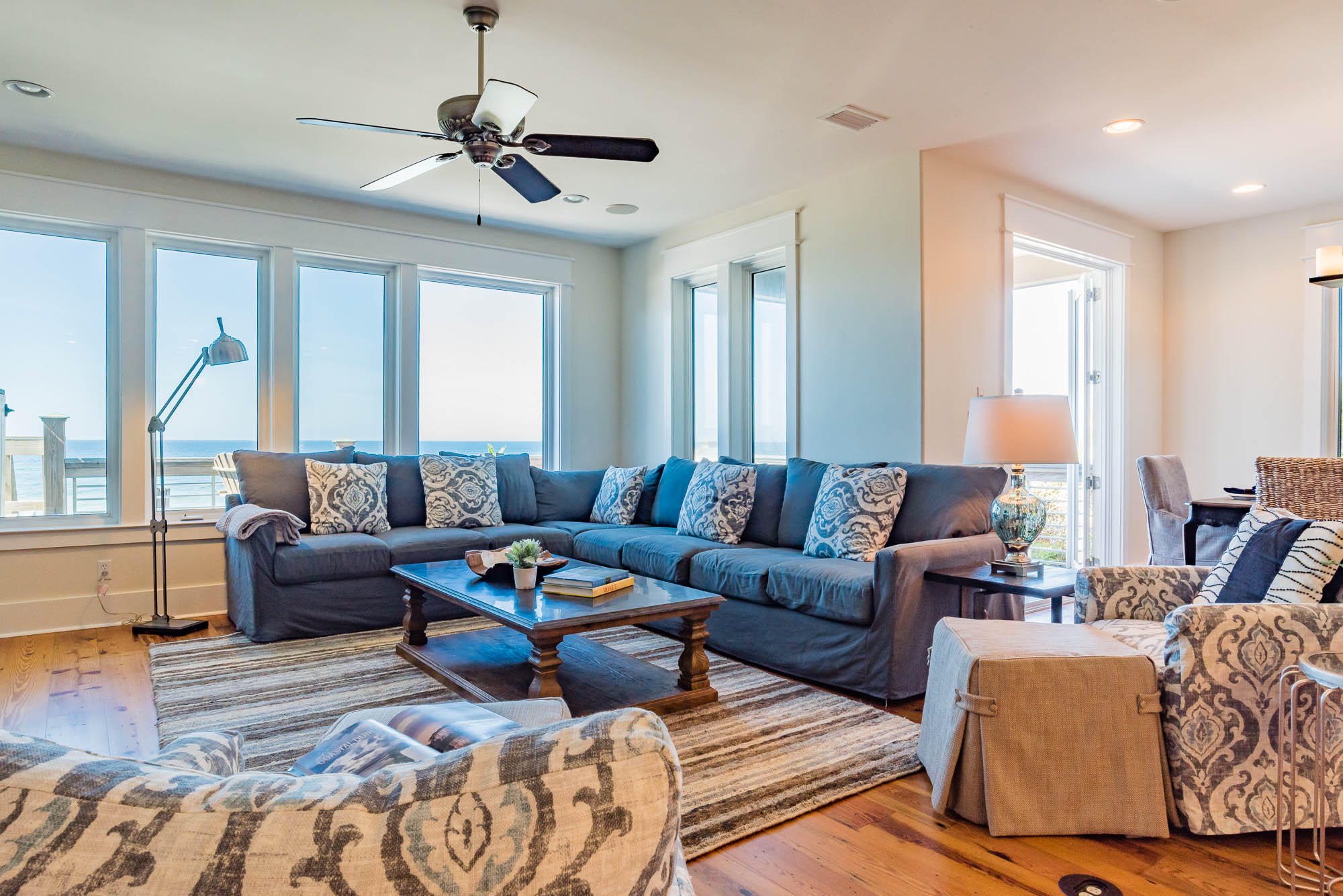 179 Pelican Circle Seacrest, FL 32461 - Photo 31 of 87 a living room with furniture ceiling fan and a window