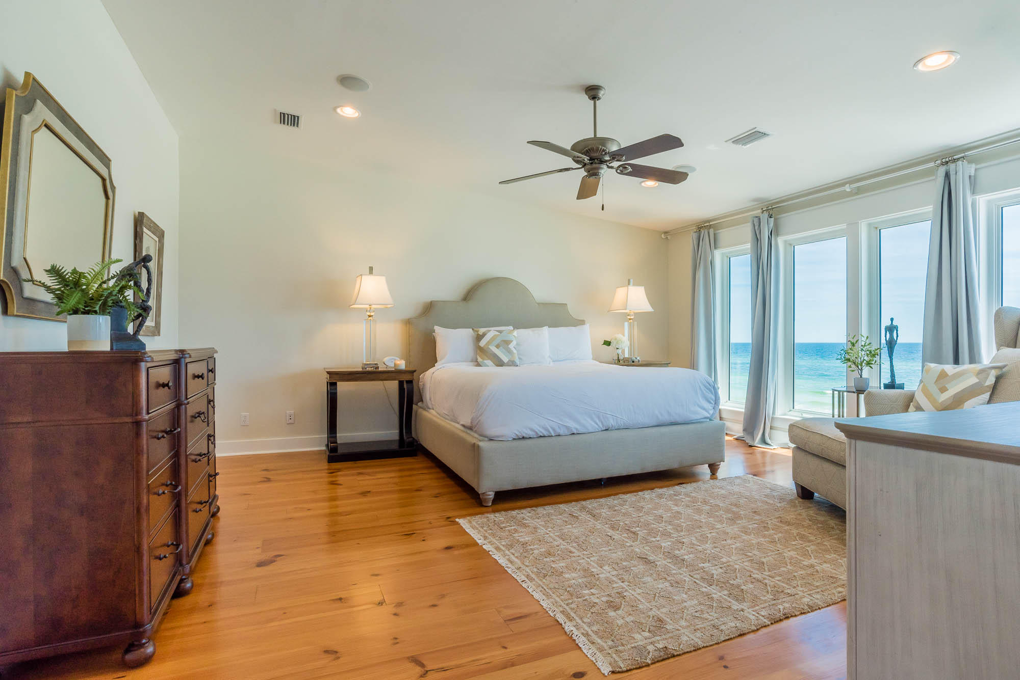 179 Pelican Circle Seacrest, FL 32461 - Photo 42 of 87 a bedroom with a large bed and a couch