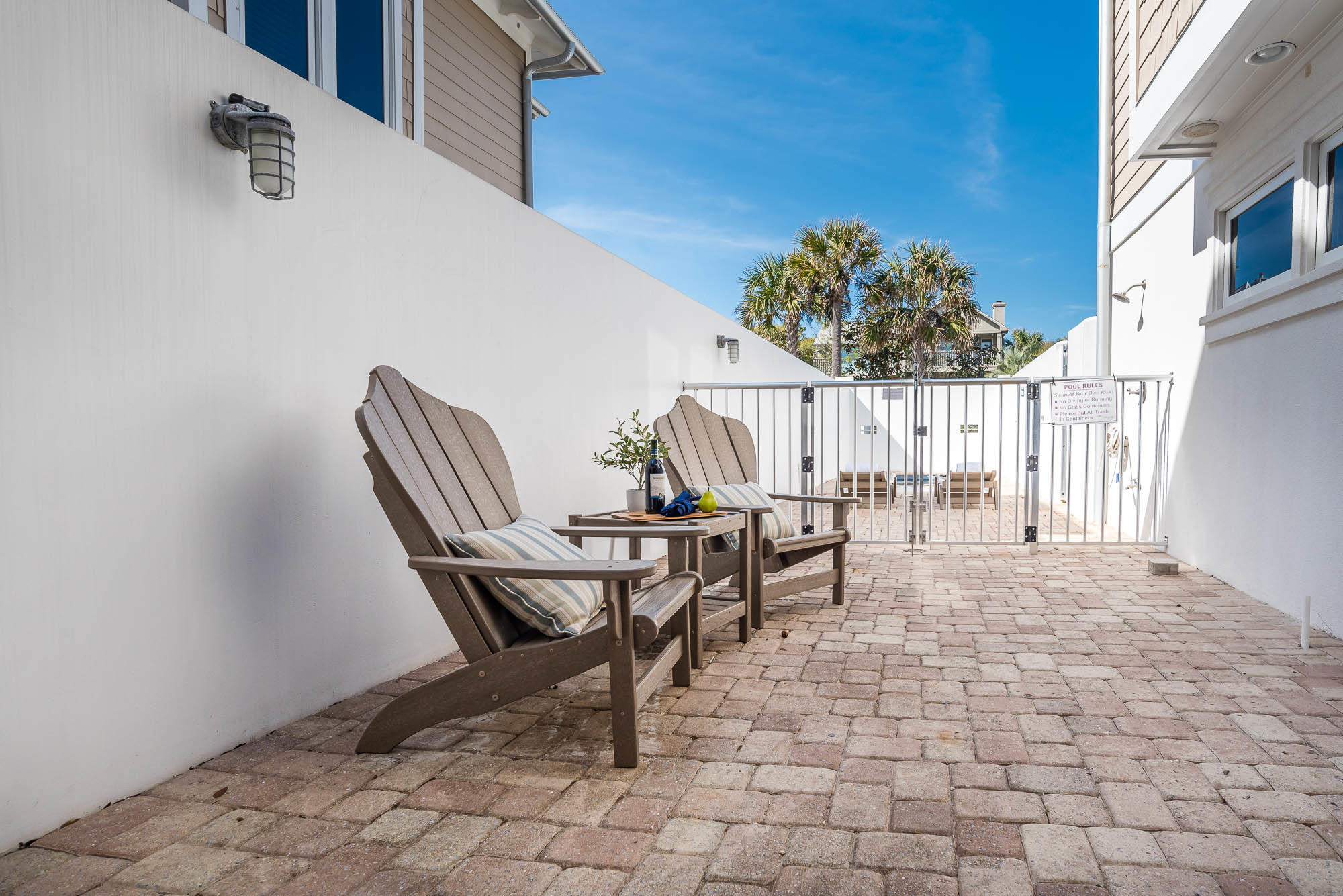 179 Pelican Circle Seacrest, FL 32461 - Photo 47 of 87 a view of a patio with a table and chairs
