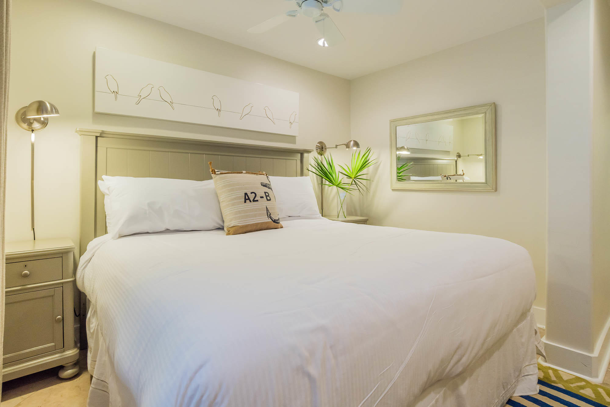 179 Pelican Circle Seacrest, FL 32461 - Photo 51 of 87 a bedroom with a bed and painting on the wall