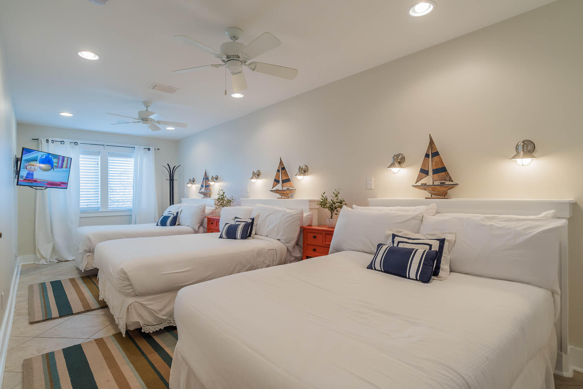 179 Pelican Circle Seacrest, FL 32461 - Photo 53 of 87 a bedroom with two beds and white walls