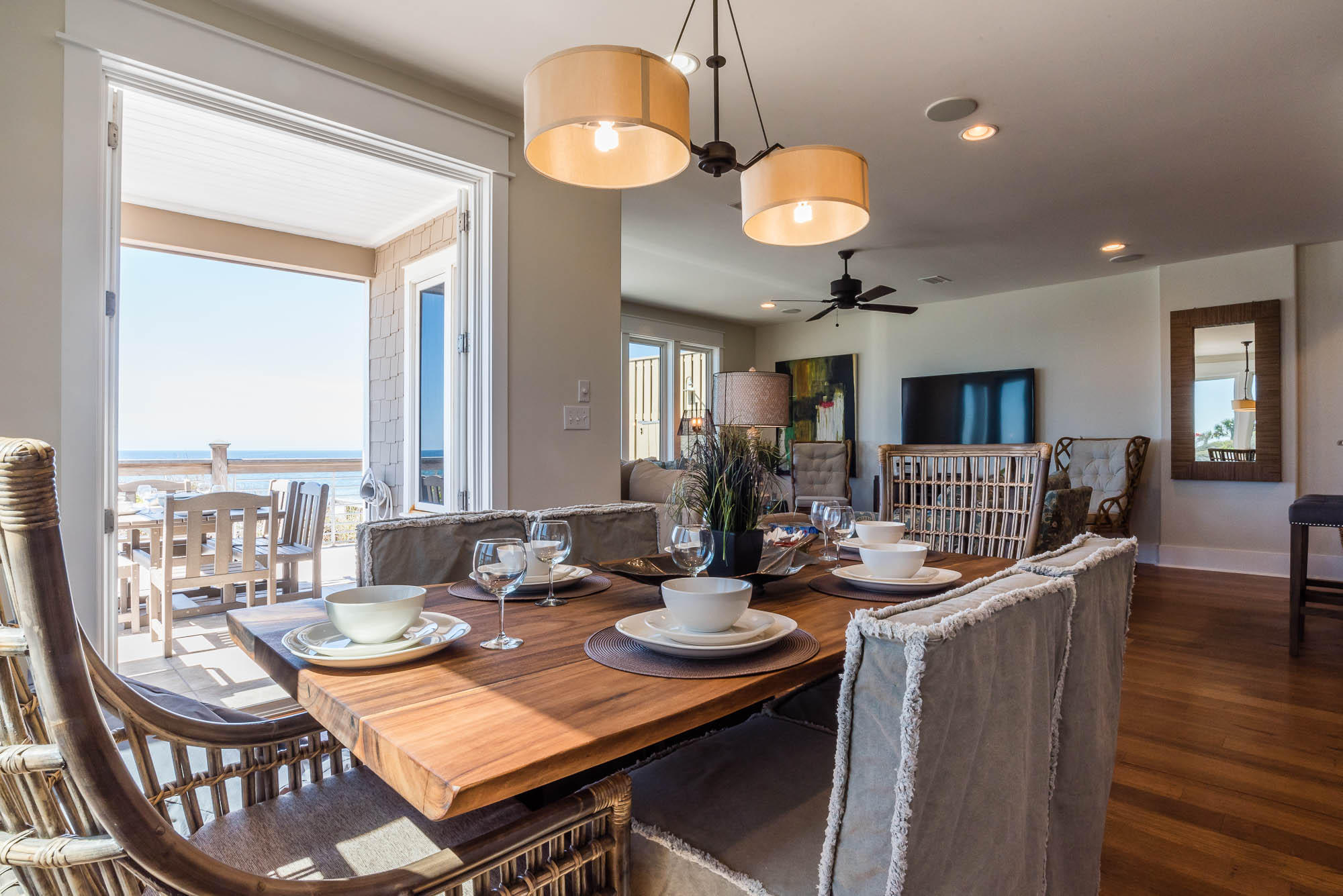 179 Pelican Circle Seacrest, FL 32461 - Photo 61 of 87 a view of a dining room with furniture wooden floor and chandelier