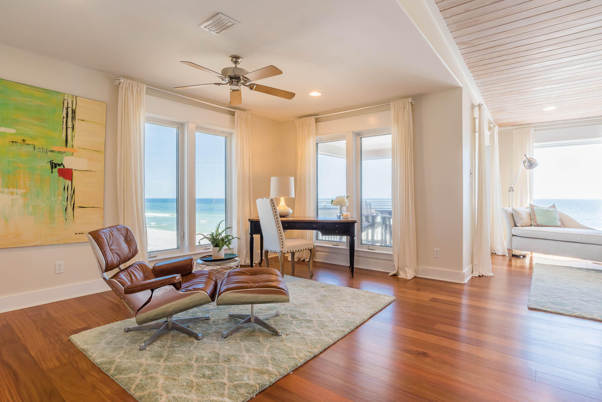 179 Pelican Circle Seacrest, FL 32461 - Photo 68 of 87 a living room with furniture and large windows