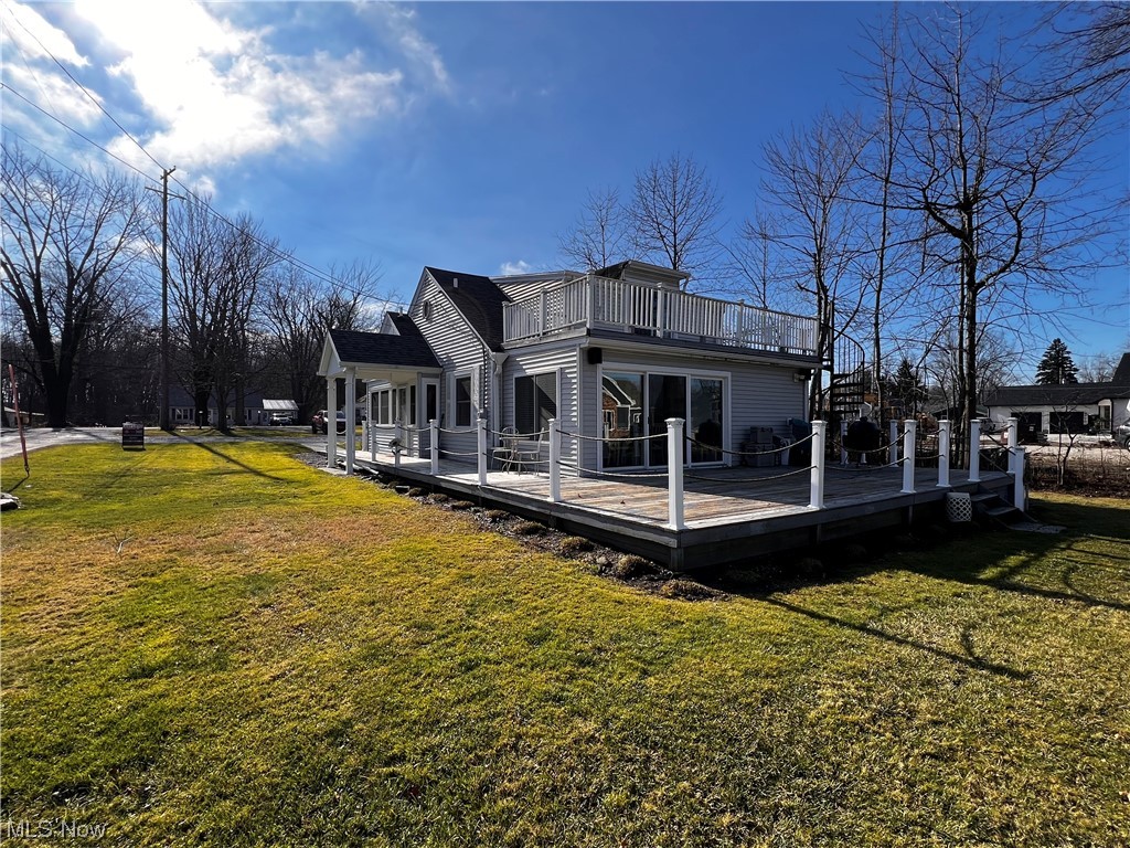 6213 Lake Road West Ashtabula, OH 44004 - Photo 5 of 30 Back of house with a deck and a yard