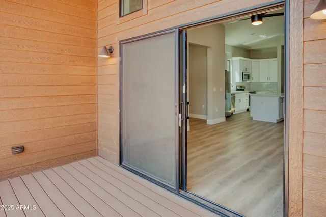 a view of a bathroom from the hallway