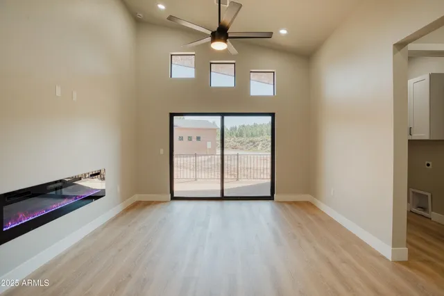 a view of an empty room and window