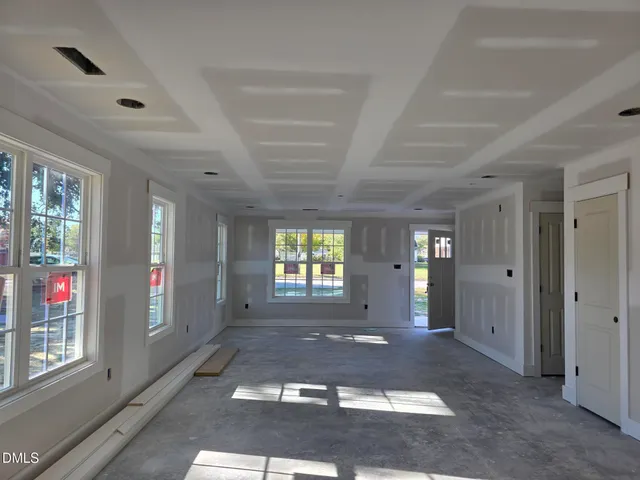 an empty room with windows