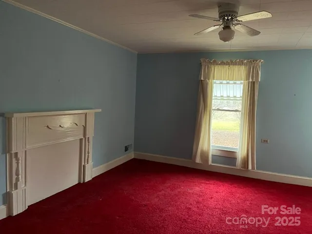 a bathroom with a bathtub sink and window
