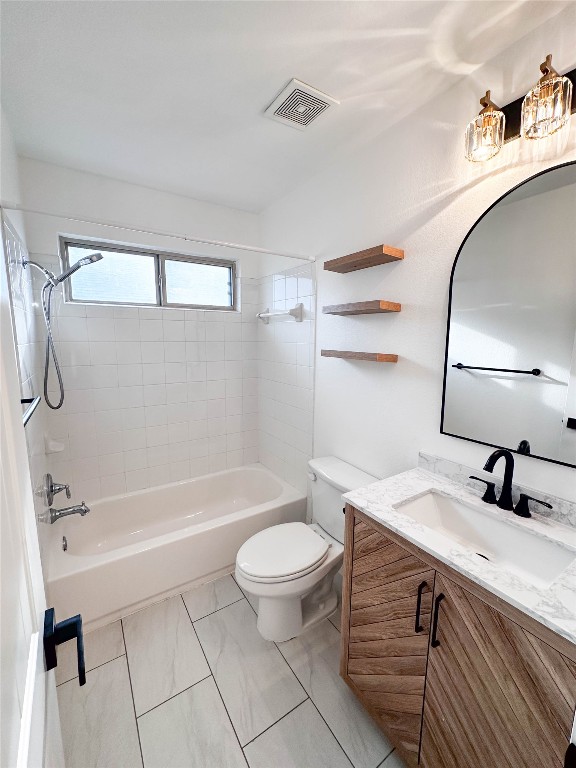1437 April Meadows Loop Georgetown, TX 78626 - Photo 12 of 27 a bathroom with a sink a toilet and a bathtub