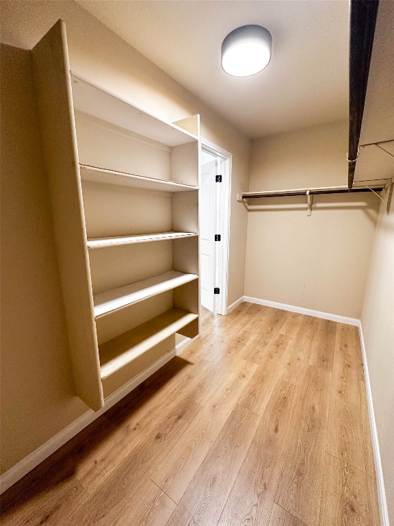 1437 April Meadows Loop Georgetown, TX 78626 - Photo 17 of 27 a view of an empty room and wooden floor