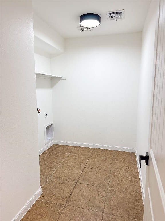 1437 April Meadows Loop Georgetown, TX 78626 - Photo 18 of 27 an empty room with a workbench