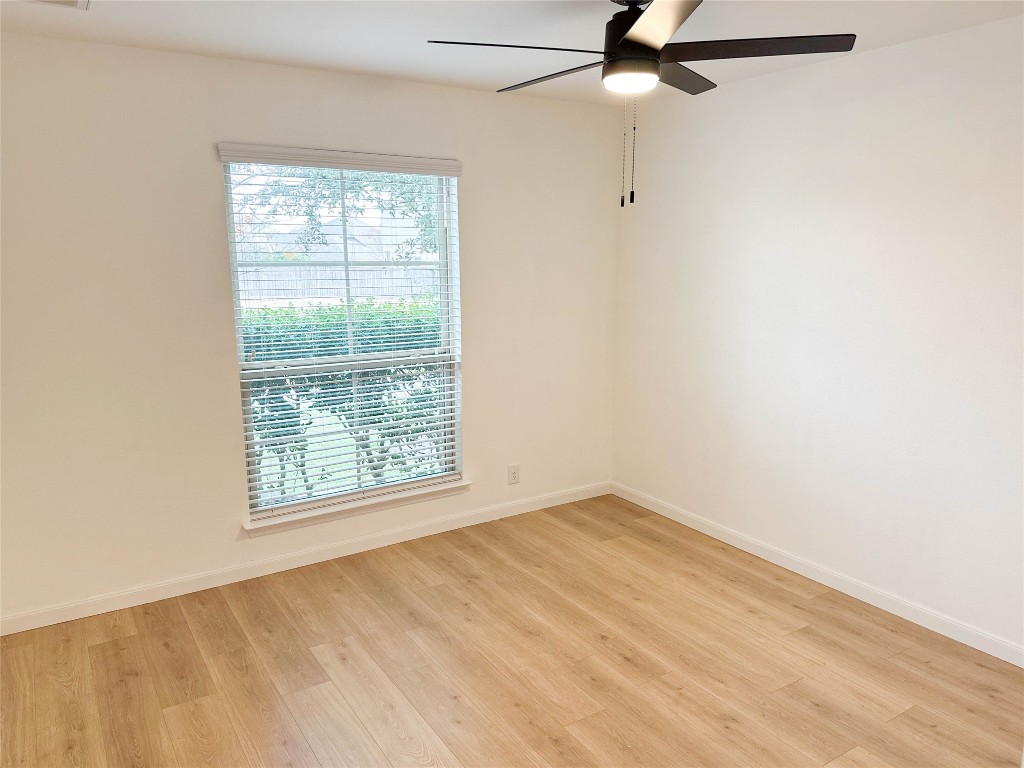 1437 April Meadows Loop Georgetown, TX 78626 - Photo 20 of 27 an empty room with a window