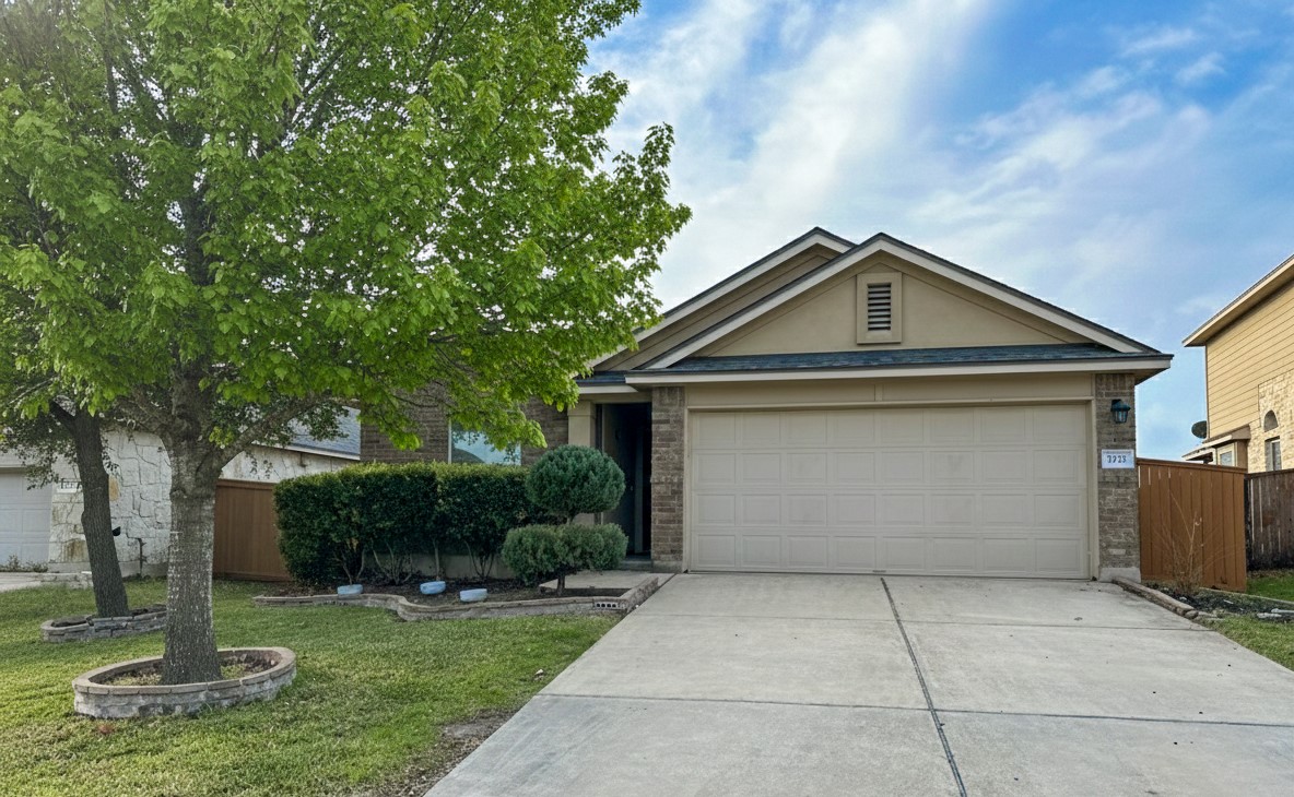 1437 April Meadows Loop Georgetown, TX 78626 - Photo 2 of 27 a front view of a house with a yard