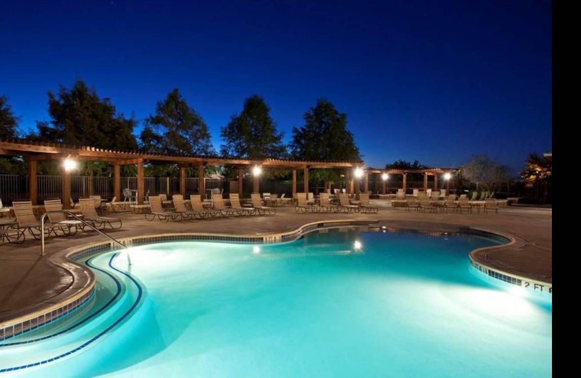 1437 April Meadows Loop Georgetown, TX 78626 - Photo 23 of 27 a swimming pool with outdoor seating and yard