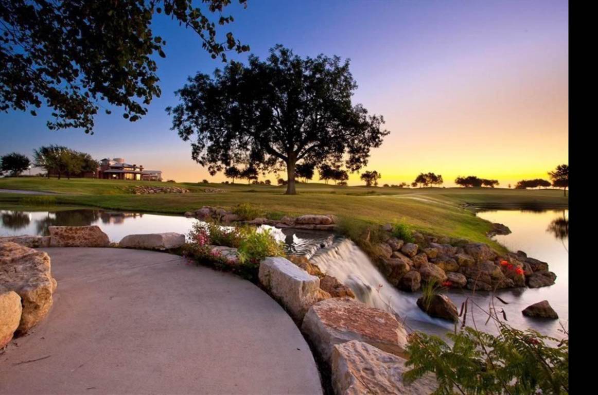 1437 April Meadows Loop Georgetown, TX 78626 - Photo 24 of 27 a view of a lake with houses