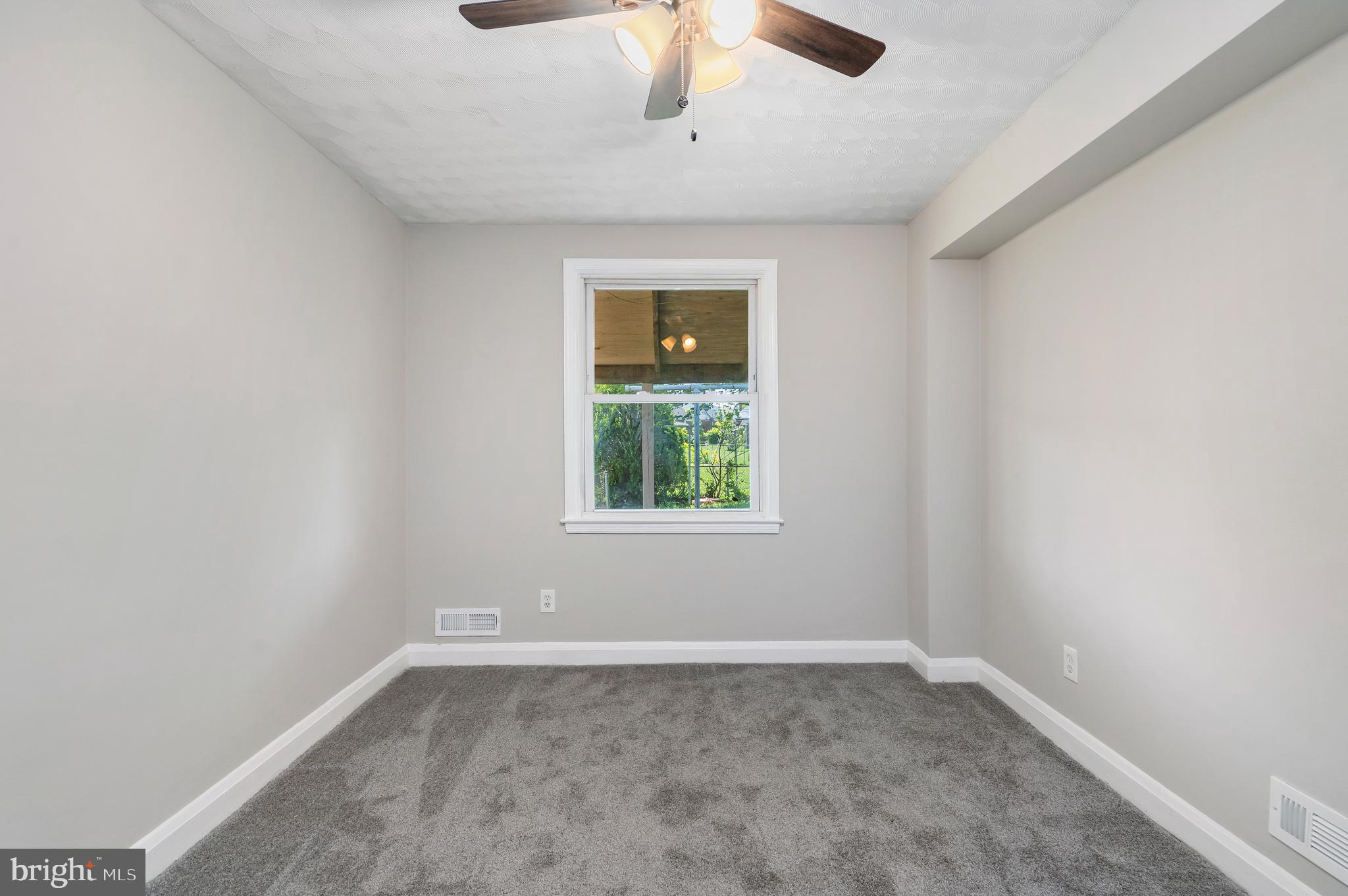 6519 Langdale Road Baltimore, MD 21237 - Photo 22 of 29 Warm and Inviting Bedroom