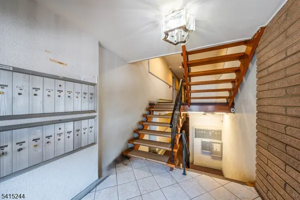 a view of entryway with stairs