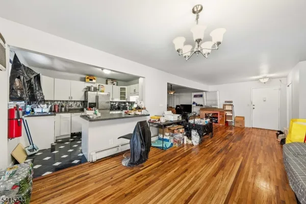 a very nice looking dining room with a table and chairs