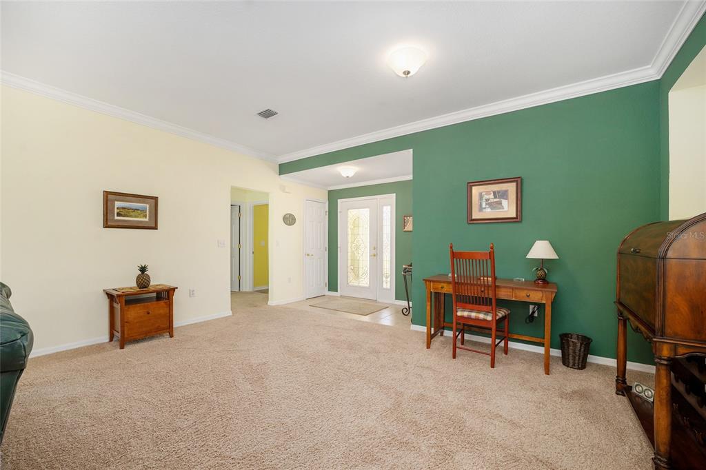 12309 Southeast 92nd Court Road Summerfield, FL 34491 - Photo 10 of 81 a workspace with furniture and a window