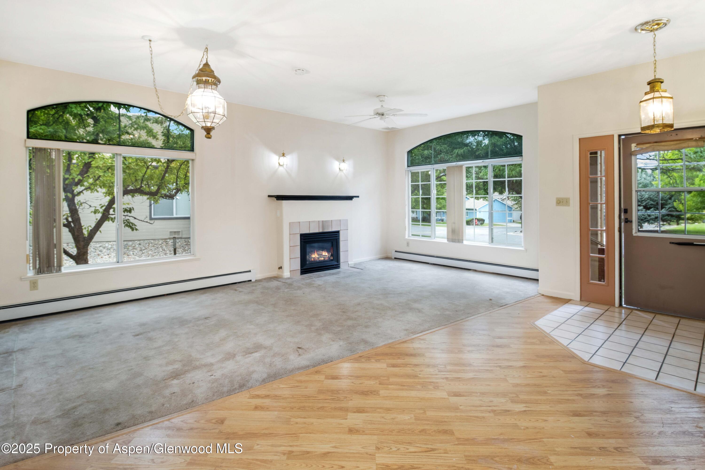 62 Limberpine Circle Parachute, CO 81635 - Photo 21 of 26 a view of livingroom with window swimming pool and outdoor space