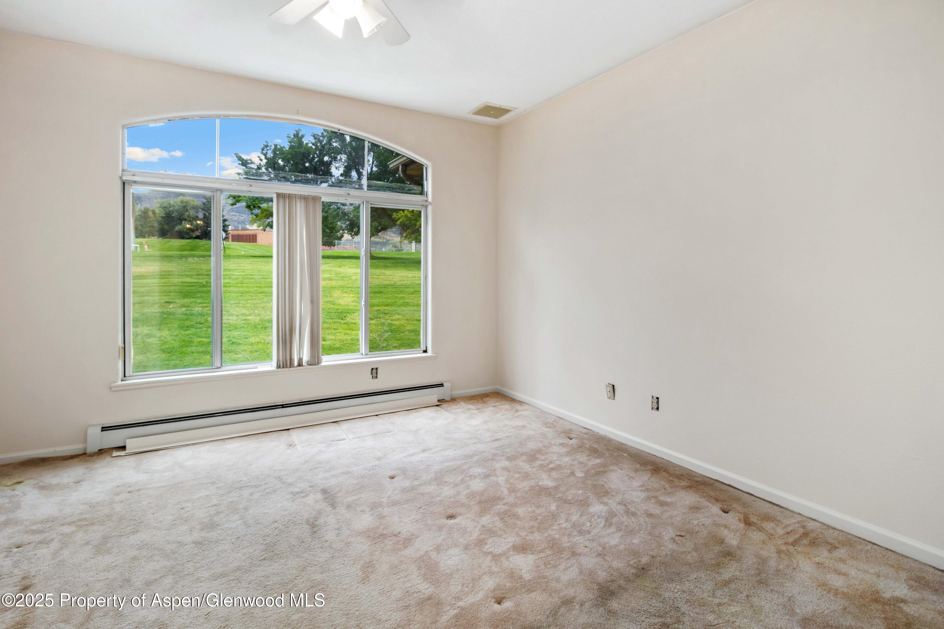 62 Limberpine Circle Parachute, CO 81635 - Photo 24 of 26 an empty room with a window