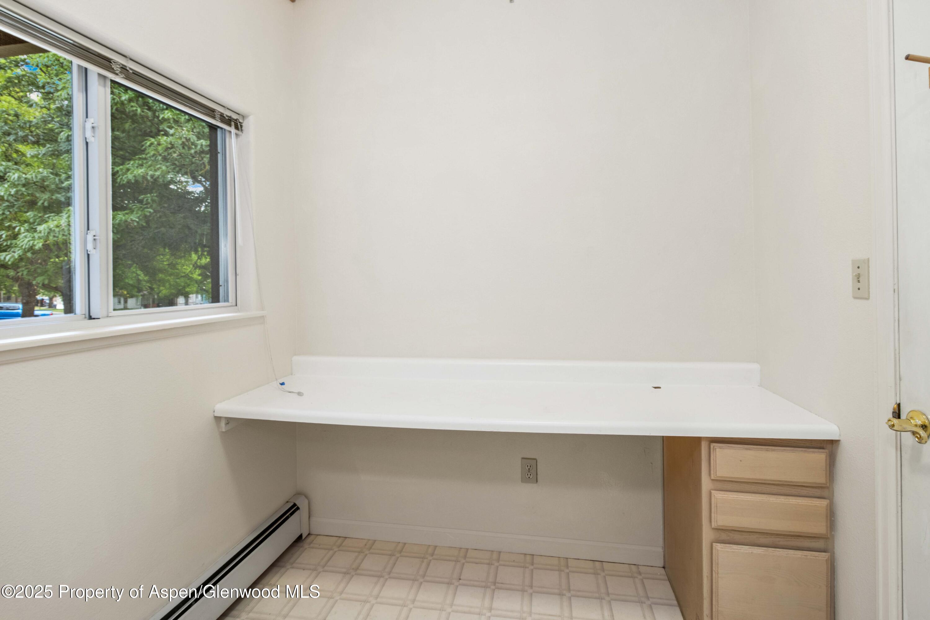 62 Limberpine Circle Parachute, CO 81635 - Photo 9 of 26 a view of an empty room with a window