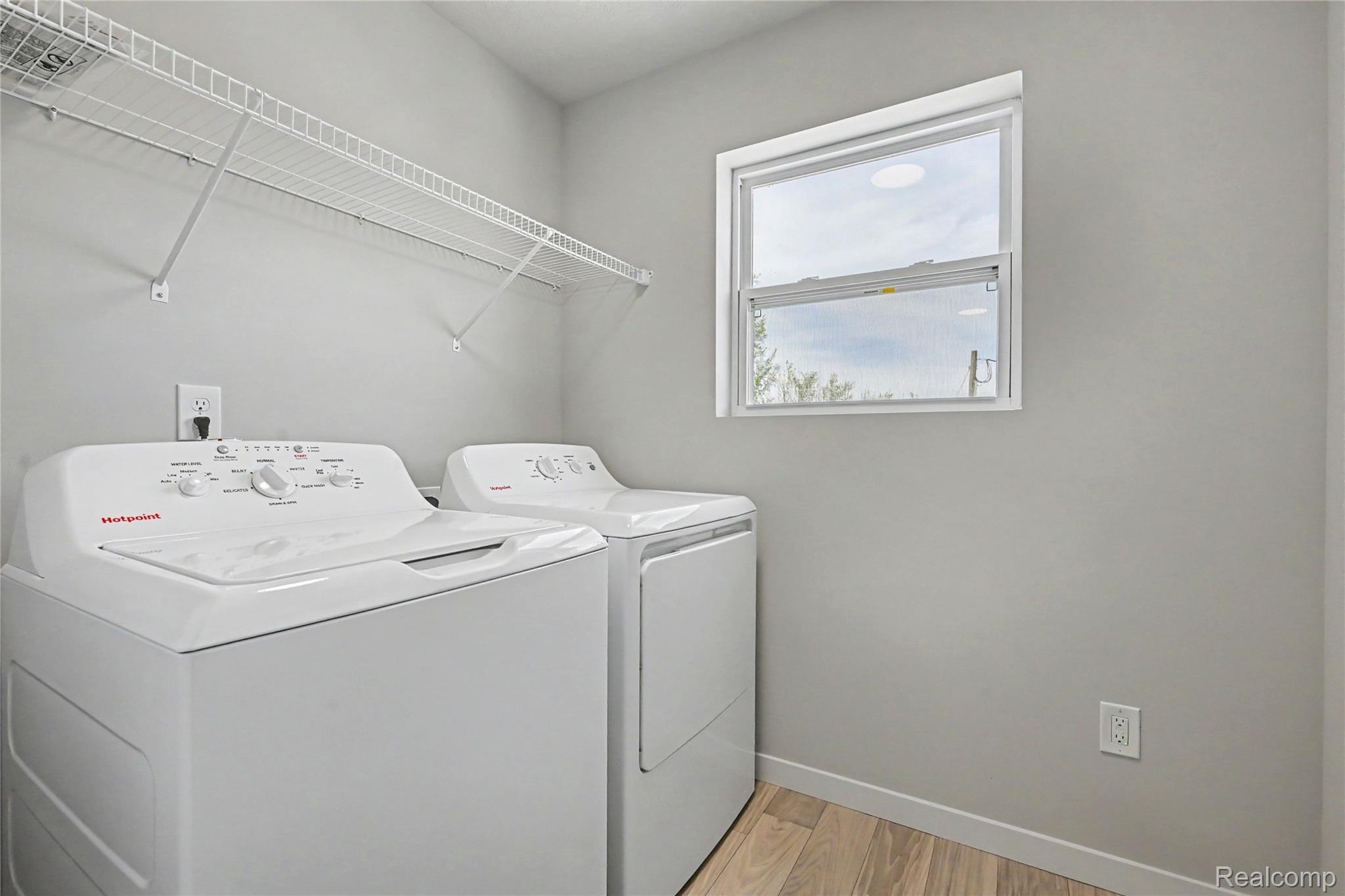 1230 Lockes Street Howell, MI 48843 - Photo 7 of 27 Stock Photo-Laundry