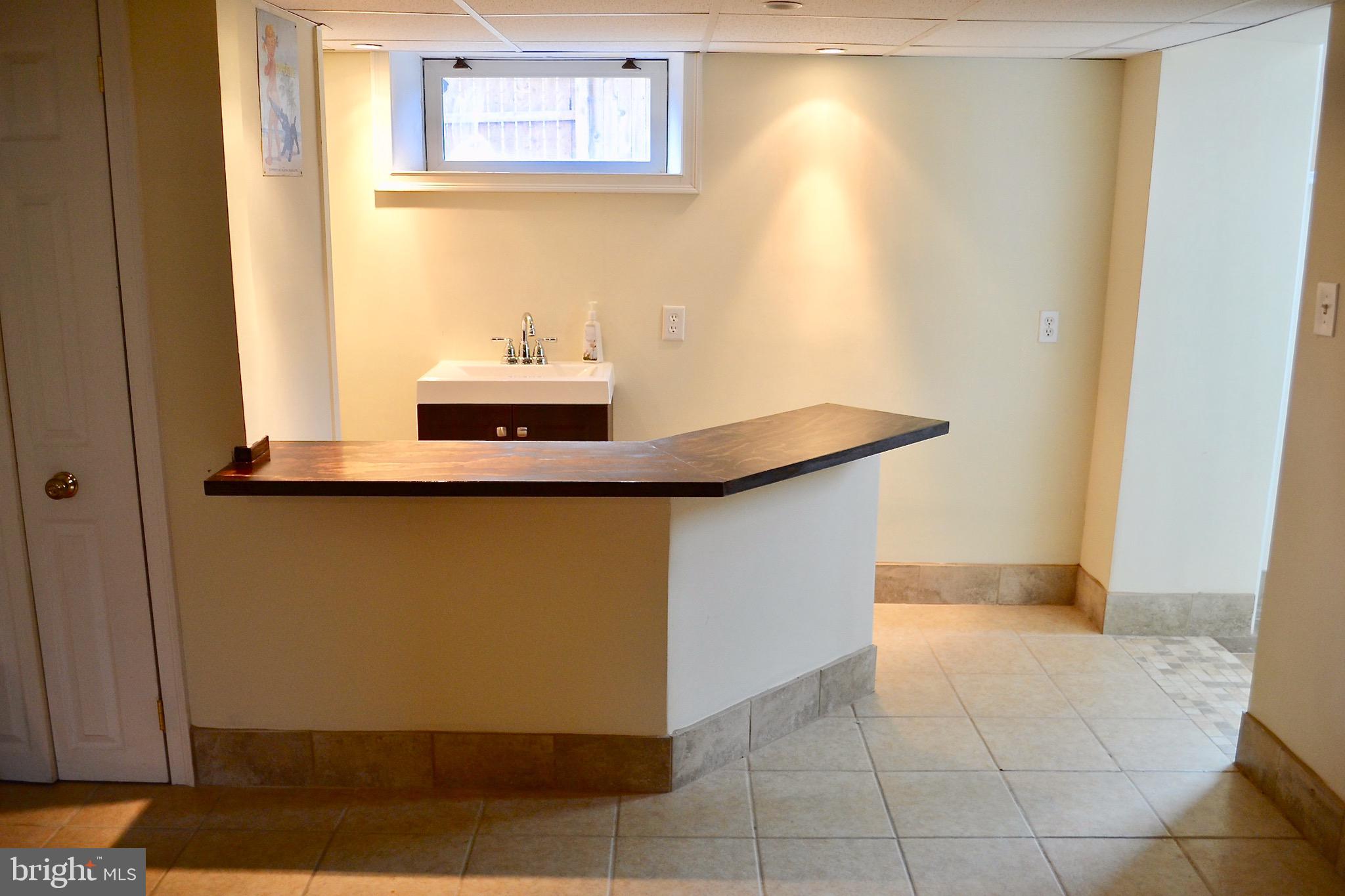 201 Ellis Road Willow Grove, PA 19090 - Photo 21 of 26 Basement wet bar - standard chair height