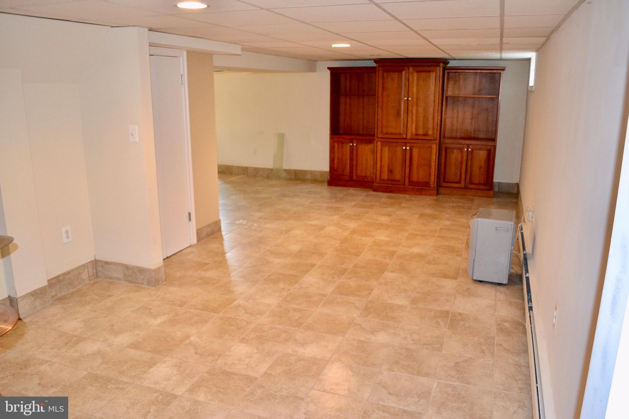 201 Ellis Road Willow Grove, PA 19090 - Photo 22 of 26 Half of fully tiled basement