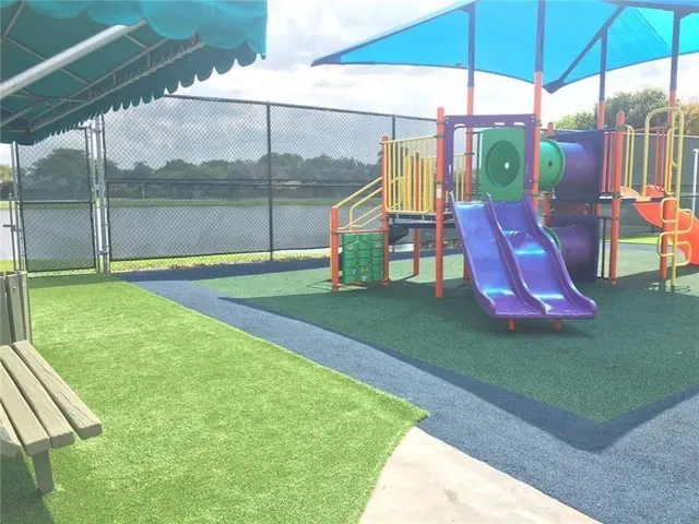 a view of a park with slide