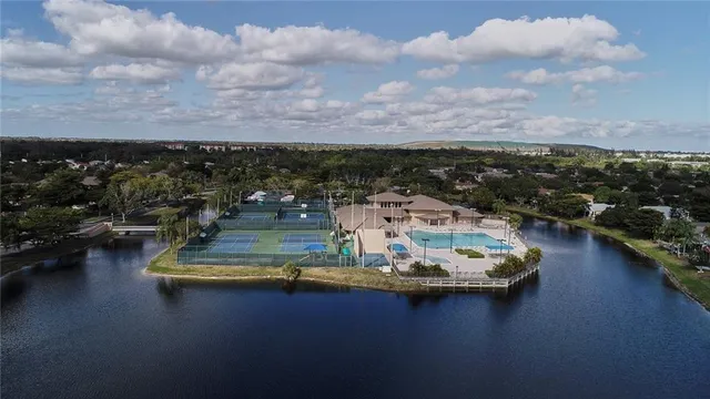 a view of a lake with a car parked