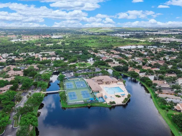 an aerial view of a house with a garden