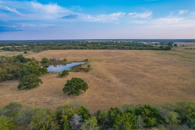 a view of a lake with outdoor space