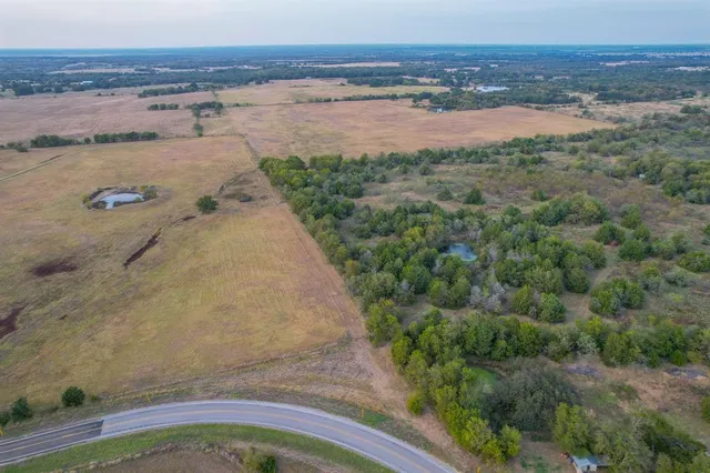 a view of a swimming pool with an outdoor space