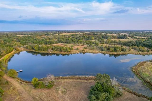 a view of an ocean and city