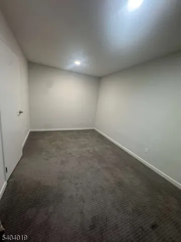 an empty room with a empty space and window