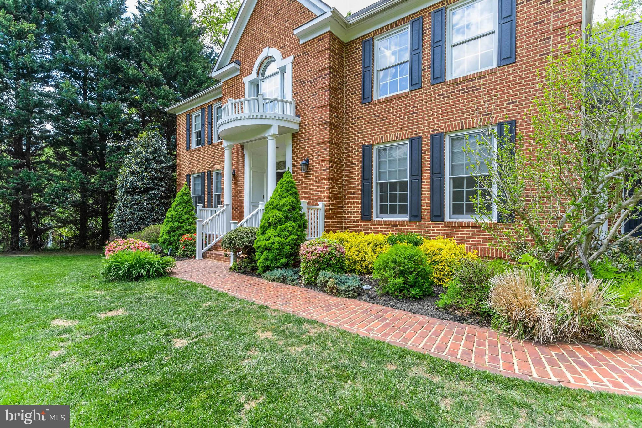 7600 Maple Branch Road Clifton, VA 20124 - Photo 5 of 66 Brick walkway leading to covered entrance