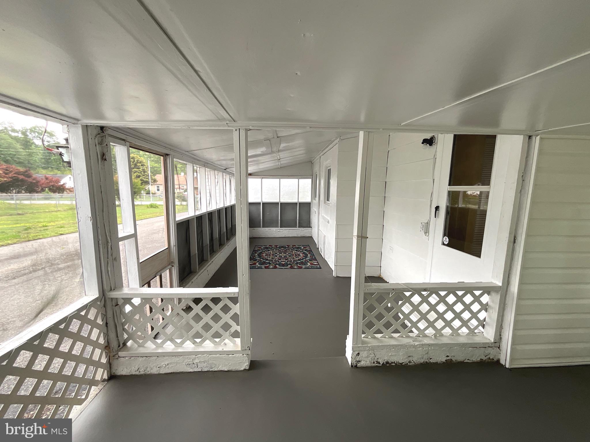 86 Kelley Road Fredericksburg, VA 22405 - Photo 35 of 36 a living room with furniture and a floor to ceiling window