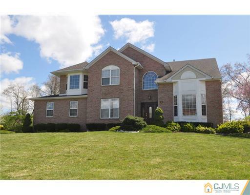 11 Gramercy Road Monmouth Junction, NJ 08852 - Photo 1 of 25 a front view of house with yard and trees