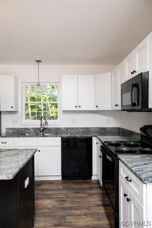 22 Abrams Road Farmville, VA 23901 - Photo 11 of 42 a kitchen with stainless steel appliances granite countertop a stove a sink and a microwave
