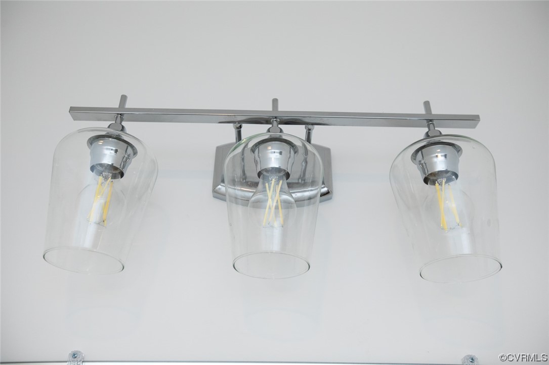 22 Abrams Road Farmville, VA 23901 - Photo 32 of 42 a close view of light fixtures and racks on th wall