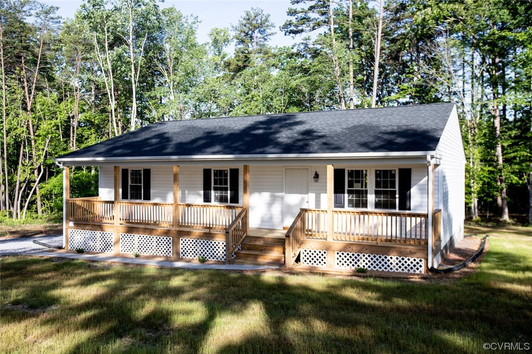 22 Abrams Road Farmville, VA 23901 - Photo 4 of 42 a view of house with backyard and outdoor seating