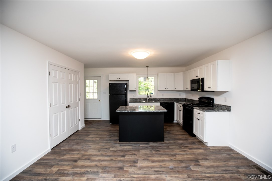 22 Abrams Road Farmville, VA 23901 - Photo 7 of 42 a kitchen with kitchen island a sink a counter top space and stainless steel appliances