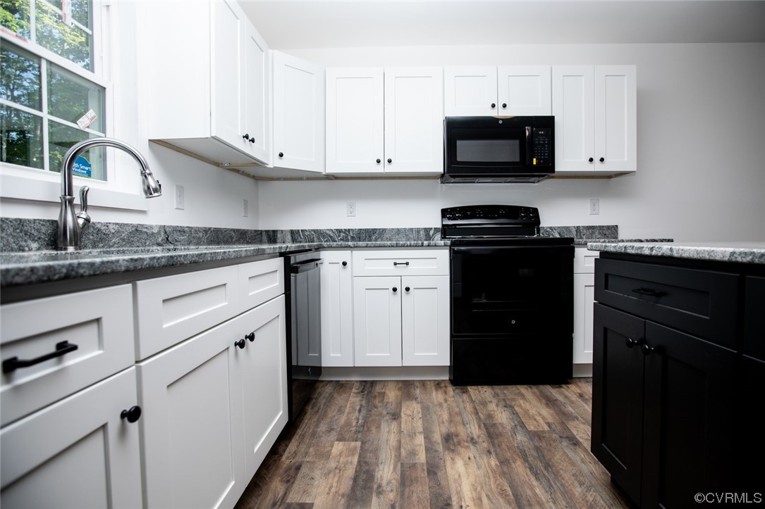22 Abrams Road Farmville, VA 23901 - Photo 8 of 42 a kitchen with stainless steel appliances granite countertop a stove a sink and a microwave