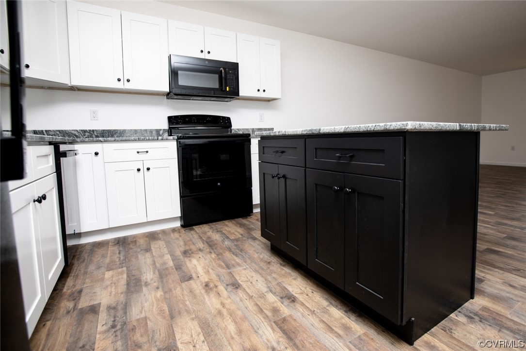 22 Abrams Road Farmville, VA 23901 - Photo 10 of 42 a kitchen with a sink and a stove top oven