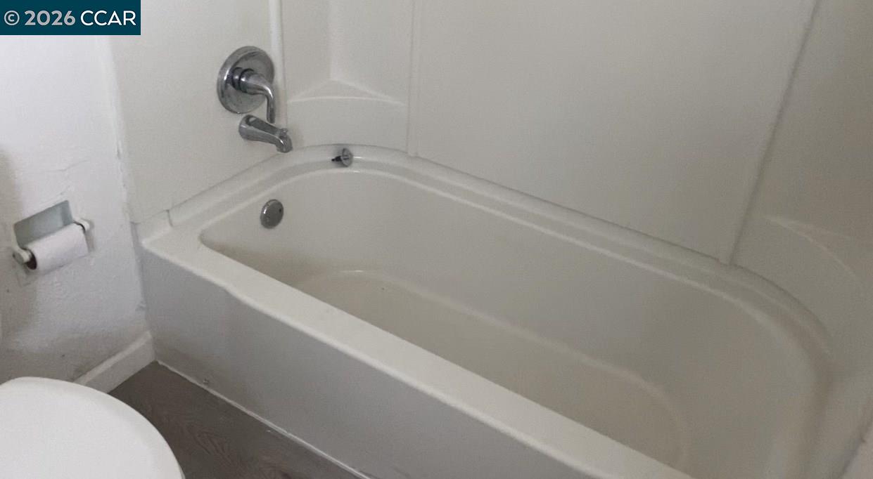 809 West 2nd Street Antioch, CA 94509 - Photo 17 of 18 a bathroom with a sink and toilet