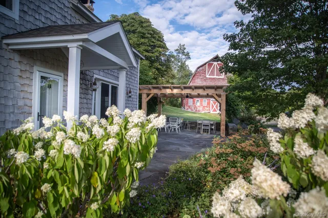 a sign that is on a brick wall