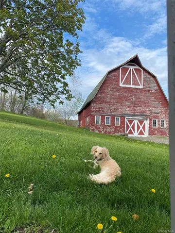 a view of a livingroom with furniture and a couch