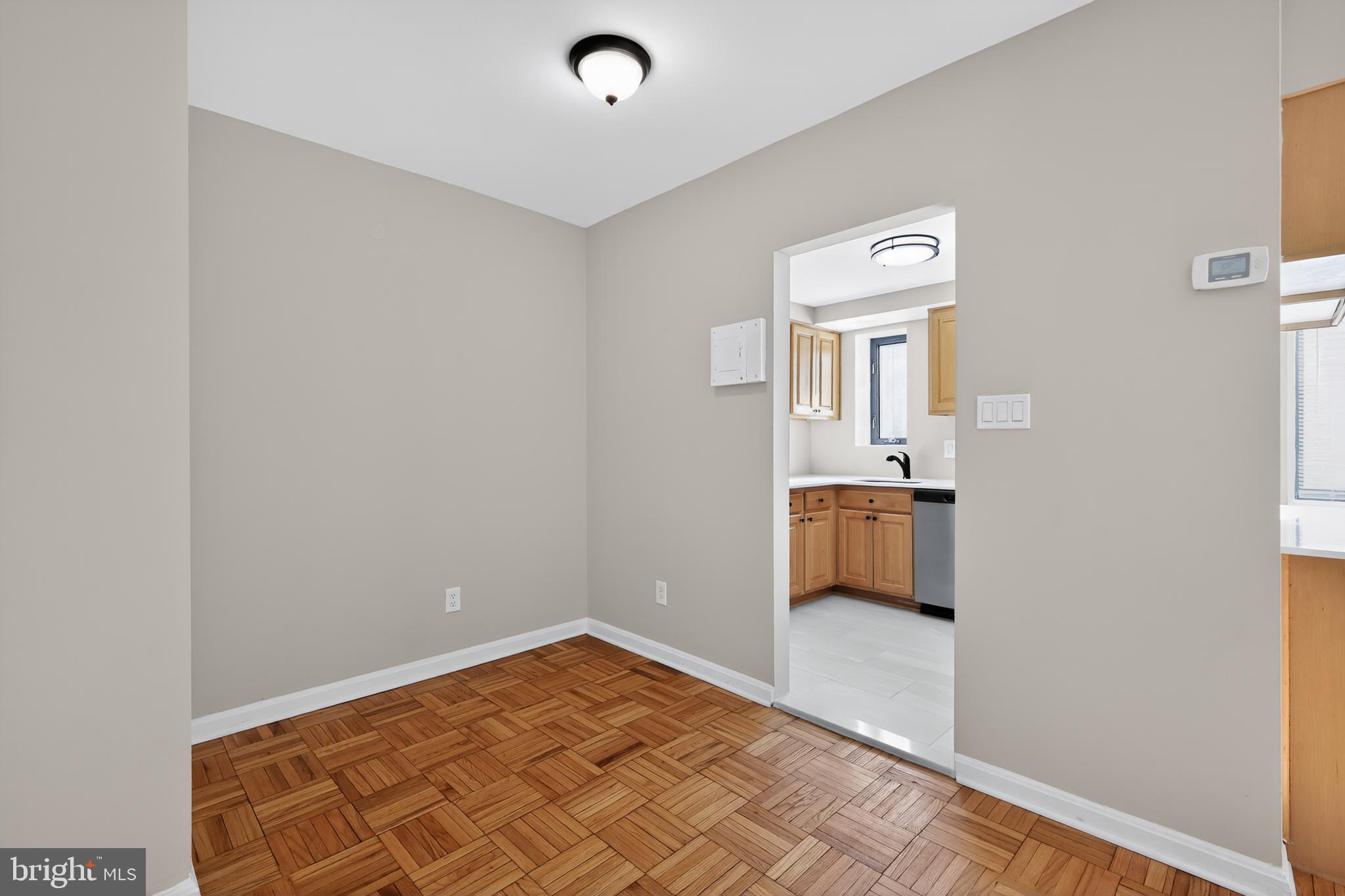 3701 Connecticut Avenue Northwest, Unit 233 Washington, DC 20008 - Photo 26 of 31 a view of a bedroom with a bed and a window